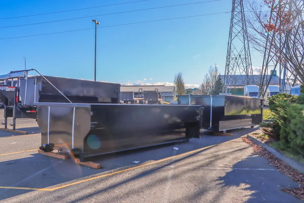 Roll-off dumpster ready for waste disposal at job site for Construction Dumpster Rental in Bellmawr